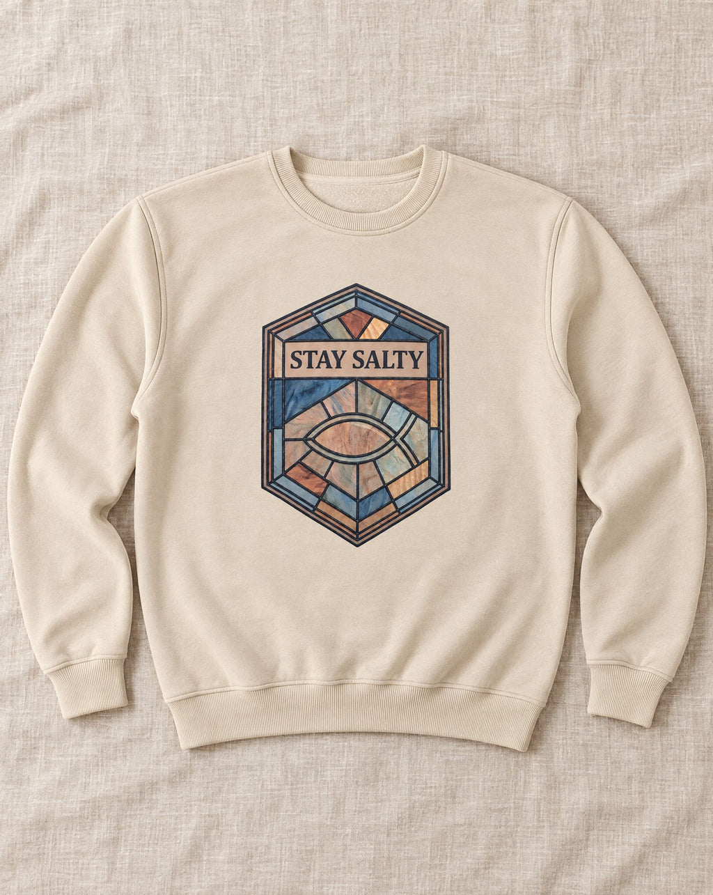 Stained Glass Stay Salty crewneck in sand, Christian apparel flat lay